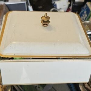 This item is a vintage mid-century modern enameled metal chafing dish, often fea